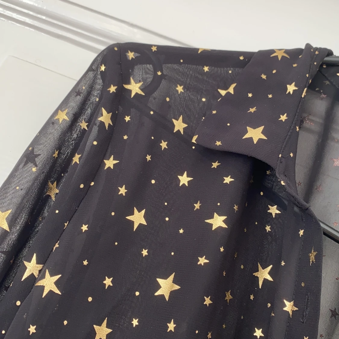 Glittrig blus med stjärnor - 90