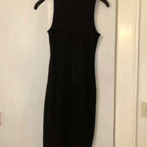 Klänning  - Klänning från jeansbolaget i strl xs, stretchig