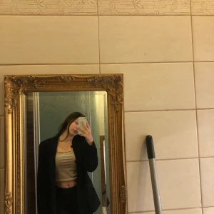 Svart kavaj utan knappar - Svart kavaj