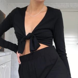  - Svart topp från Brandy Melville