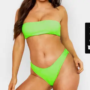 Neon grön Bikini från Boohoo har aldrig använt den eftersom storleken passar inte mig. 