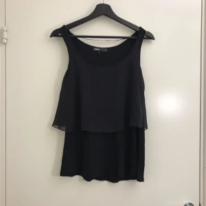  - Svart fint linne i storlek XS. Hämtas i Uppsala eller fraktas till önskad adress. 
