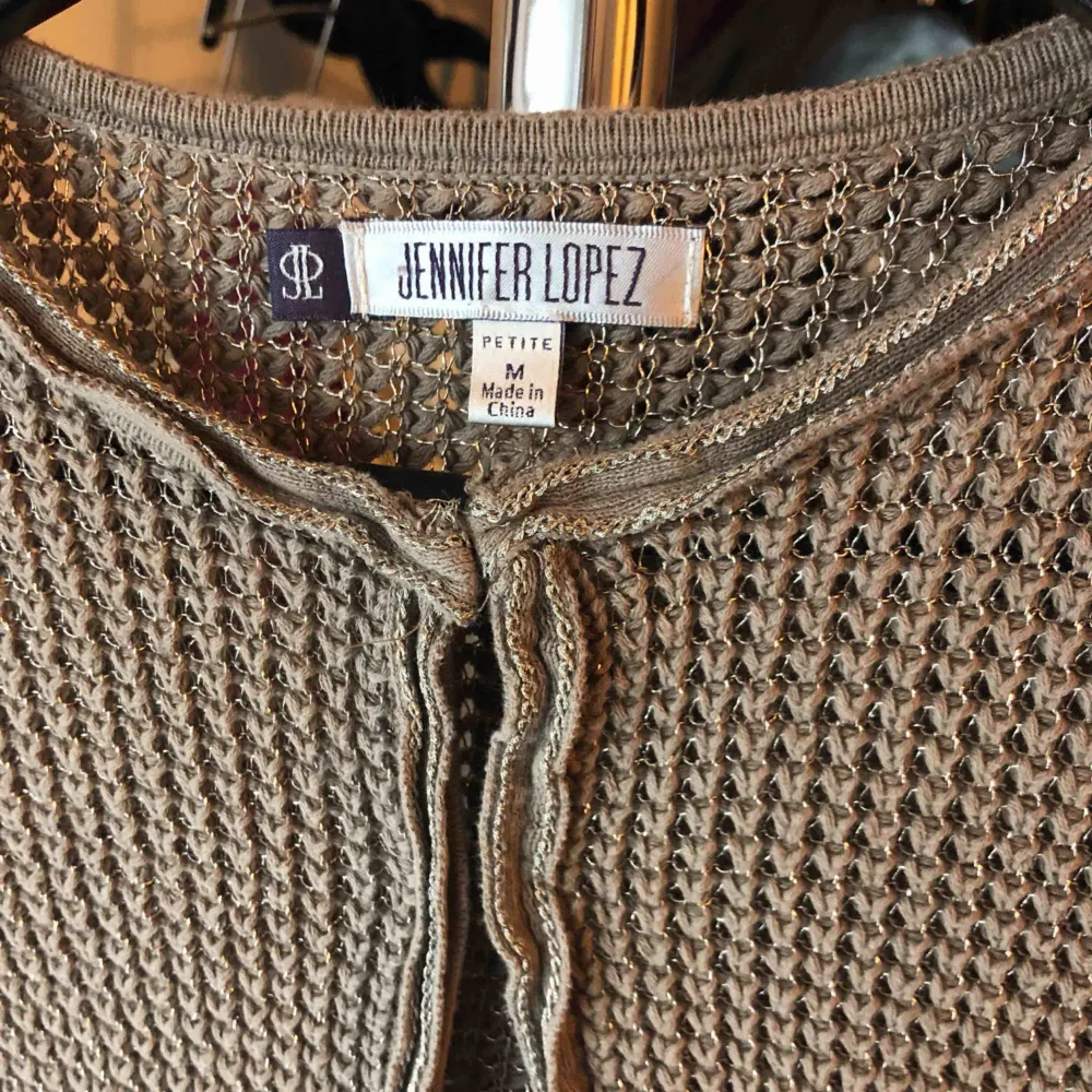 Jennifer Lopez Cardigan Used once with good condition Size: medium Color: light brownish grey w/ silver . Tröjor & Koftor.