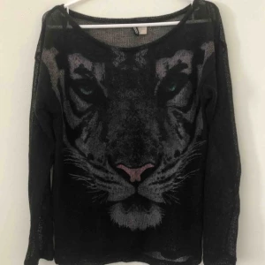  - Genomskinlig tröja