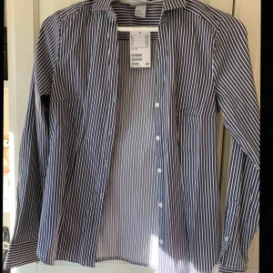  - Figursydd skjorta perfekt till sommaren