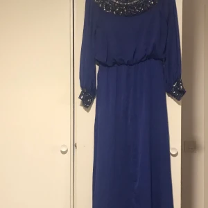 Klänning  - Använd endast en gång.