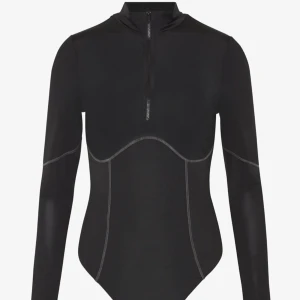 Oanvänd CONTRAST SEAM- BODY - Jätte fin Helt oanvänd body från Nelly i storlek L. Orginal pris 300kr 