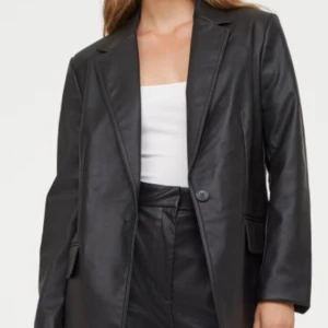 H&M Faux Leather Blazer - Size M. Fits a 36-38 for an oversized look. Worn only a few times. Good condition. Sold out online. 