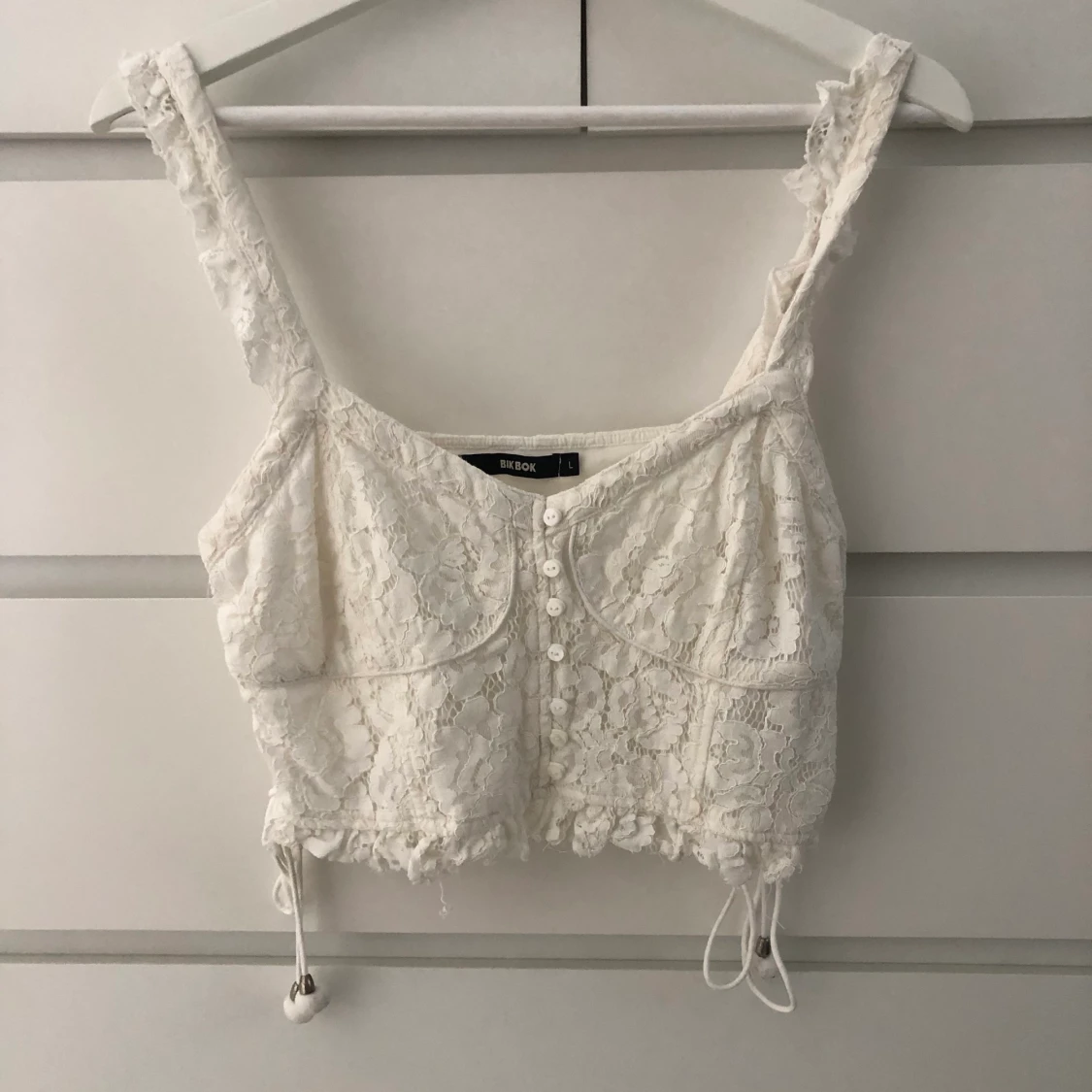 Vit topp storlek L