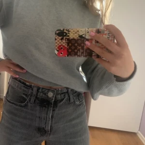 Grå stickad polotröja - Feejn stickad polotröja i nyskick!