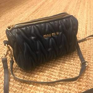 A very nice and almost new Miu Miu bag ( copy one) deep blue color , almost new!