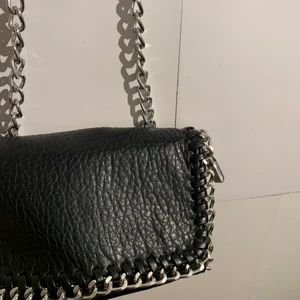 Bodycon väska. - 166 kr med inkluderad frakt.