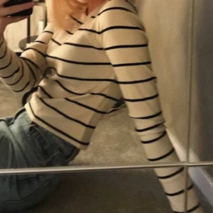 Långärmad tröja - Randig tröja storlek S.