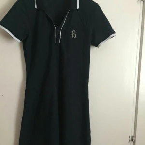 Klänning  - Strl 42