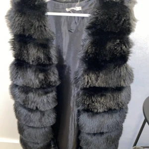 Pälsväst - Storlek S/M