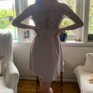  - Klänning från Nelly.com i en ljuslila färg. Aldrig använd (prislappen finns kvar). Pris kan förhandlas!