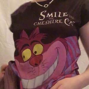 Smile like the cheshire cat t-shirt