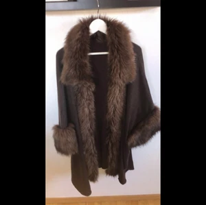 Kappa - Oanvänd brun kappa