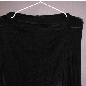  - Använd strandkjol från Nelly. Går att knyta o har slits