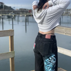 Hand-painted Hello Kitty jeans - Hand-painted, calligraffiti jeans. The pants are whashable at 40 degrees.