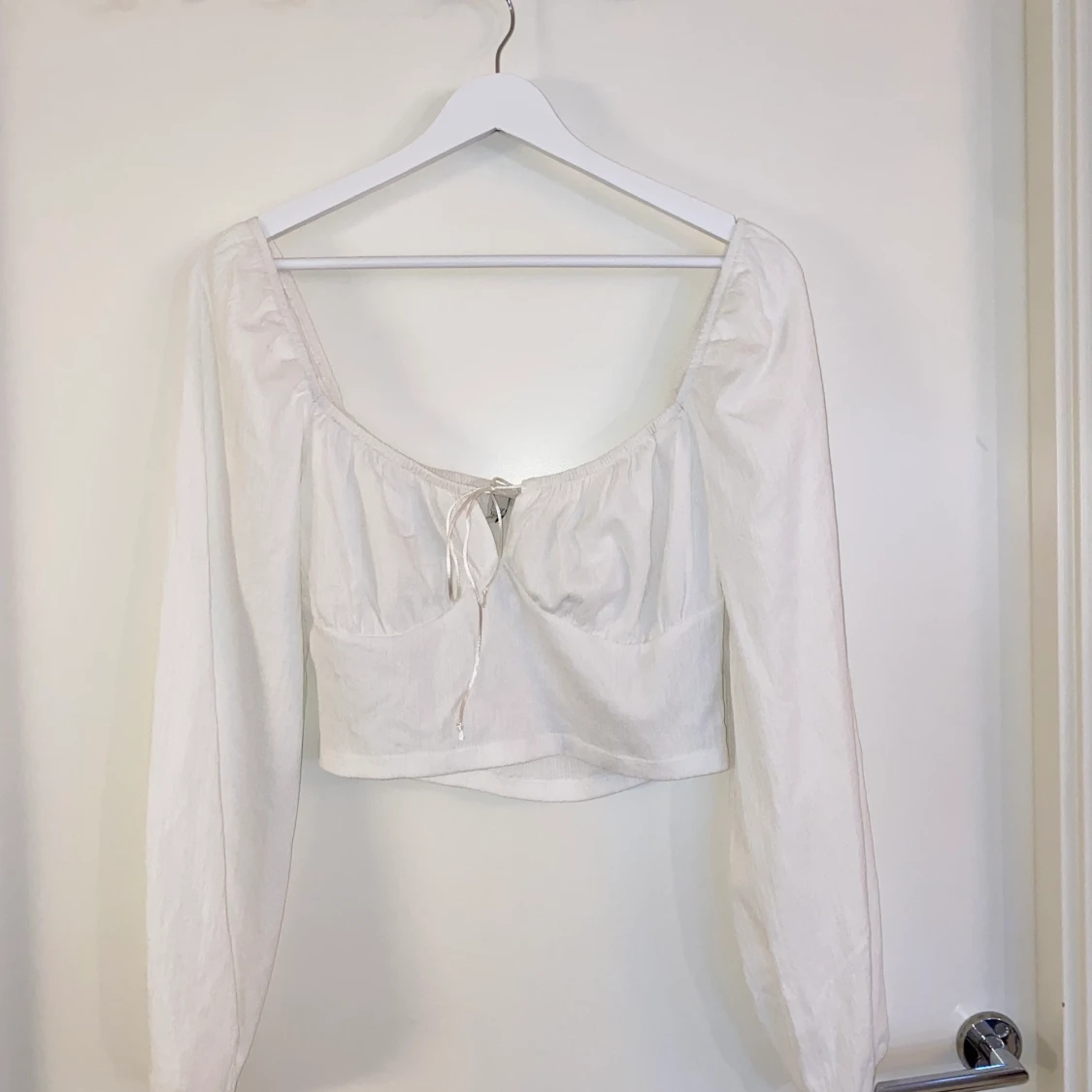 Vit topp från Bianca Ingrossos kollektion för Nelly