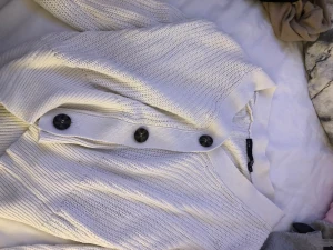 Stickad tröja  - Passar int