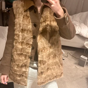 Päls vest - Äkta päls. skinn fordring, varm.