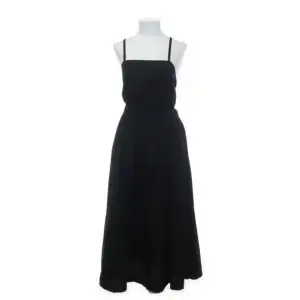 Black dress, with naked back. It fits awesome and looks great.