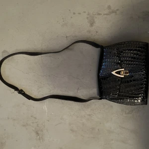 Väska - Väska men många fack 