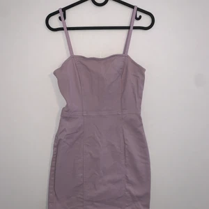 H&M lilac denim dress  - Tight fitting lilac denim dress with a zip up back, very comfortable and good length, great condition. Size 38 but runs small, fits more like a 36 or 34