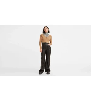 wide leg/bootcut levis faux leather - levisbyxor storlek 27 i midjan, bra skick, svarta från 70 flare kollektionen.