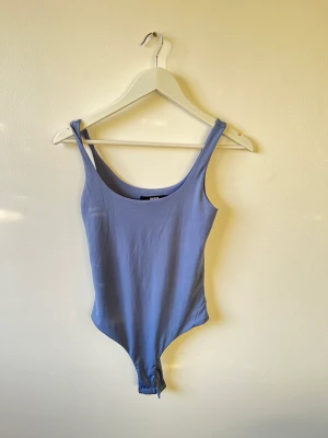 Bikbok ljusblå body - Använd 2-3 gånger, är i bra skick