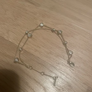 Armband med berlocker  - Gulligt armband med berlocker