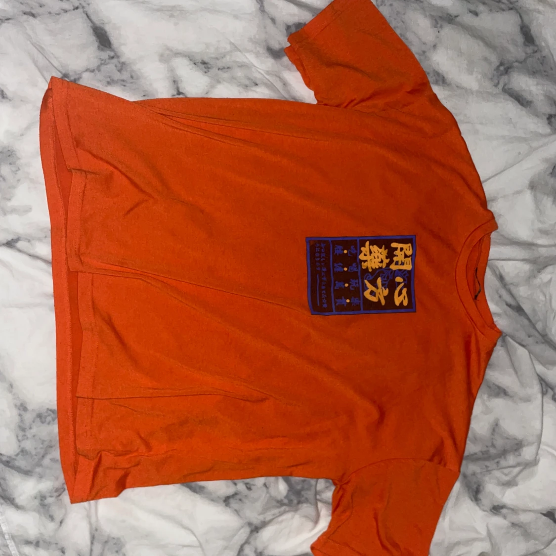 Snygg orange VHS YK2 t-shirt