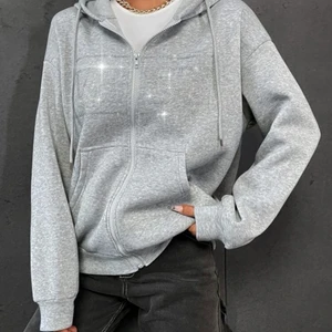 Rhinestone kofta - Jättesnygg kofta med rhinestones där det står ”WEST” oversized och superskön. Använd cirka 2 ggr💗