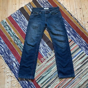 Vintage Baggyjeans  - Kansas dark blue jeans från dressman. Skit snygga och i fint skick. Sköna och stilrena. Funkar på mig med skärp som annars har storlek 28-30 i midja. För mått eller fler bilder kontakta mig!!