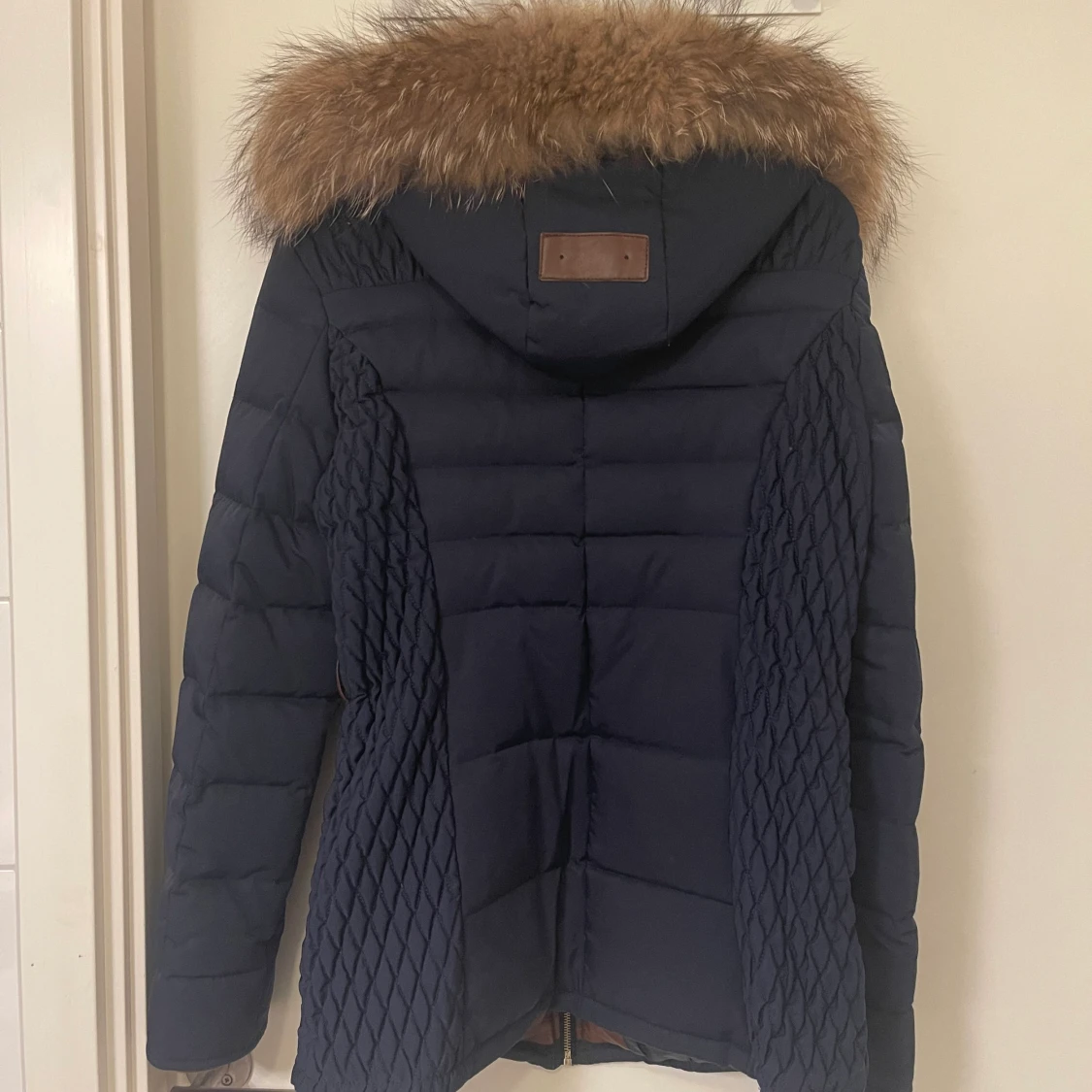 Vinterjacka. Fodrad och med äkta päls.  - 90