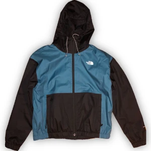 The North Face regnjacka - En knappt använd The North Face regnjacka i fin blå färg (+svart)! Perfekt nu till hösten🍂 