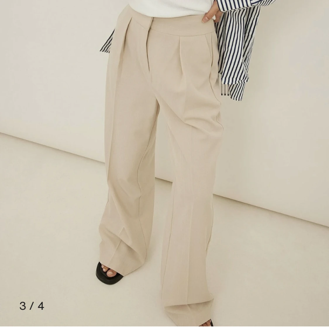 Byxor i ullblandning// oanvända  - 91