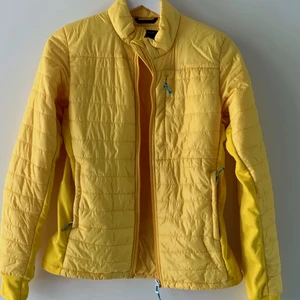 Didriksson träningsjacka  - Gul träningsjacka perfekt för löpning när det är kyligt ute eller bara en promenad