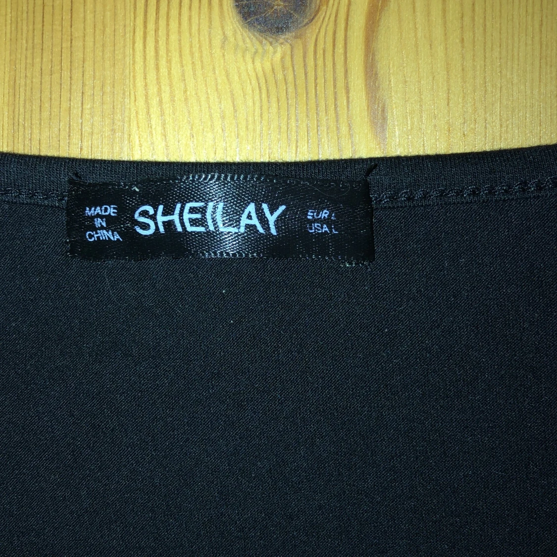 Tufft svart linne i stl L - 91