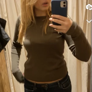 Brandy topp - Säljer min superfina gröna långärmade topp från Brandy Melville! Knappt använd och har inga defekter❤️❤️ kom privat för fler bilder
