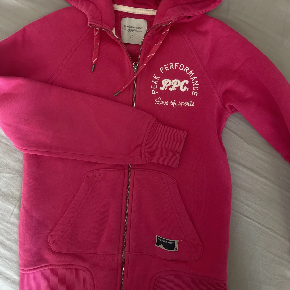 Rosa Peak Performance huvtröja - 90