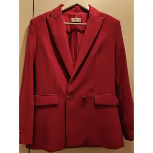 One time used. The blazer is from last year spring collection. Perfect condition. Negotiable price 