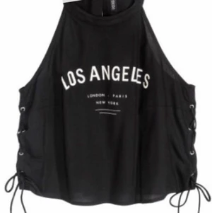 Side Laced up t-shirt - OANVÄND side laced up t-shirt. 