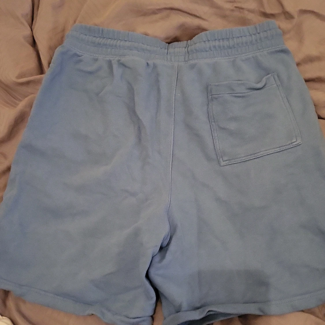Ljusblåa shorts - 90