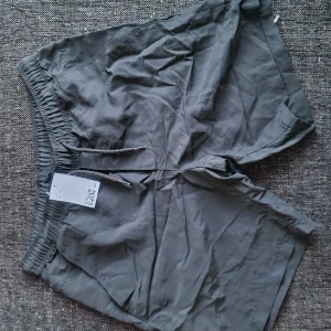 Badshorts - Svarta badshorts Helt nya med lapp