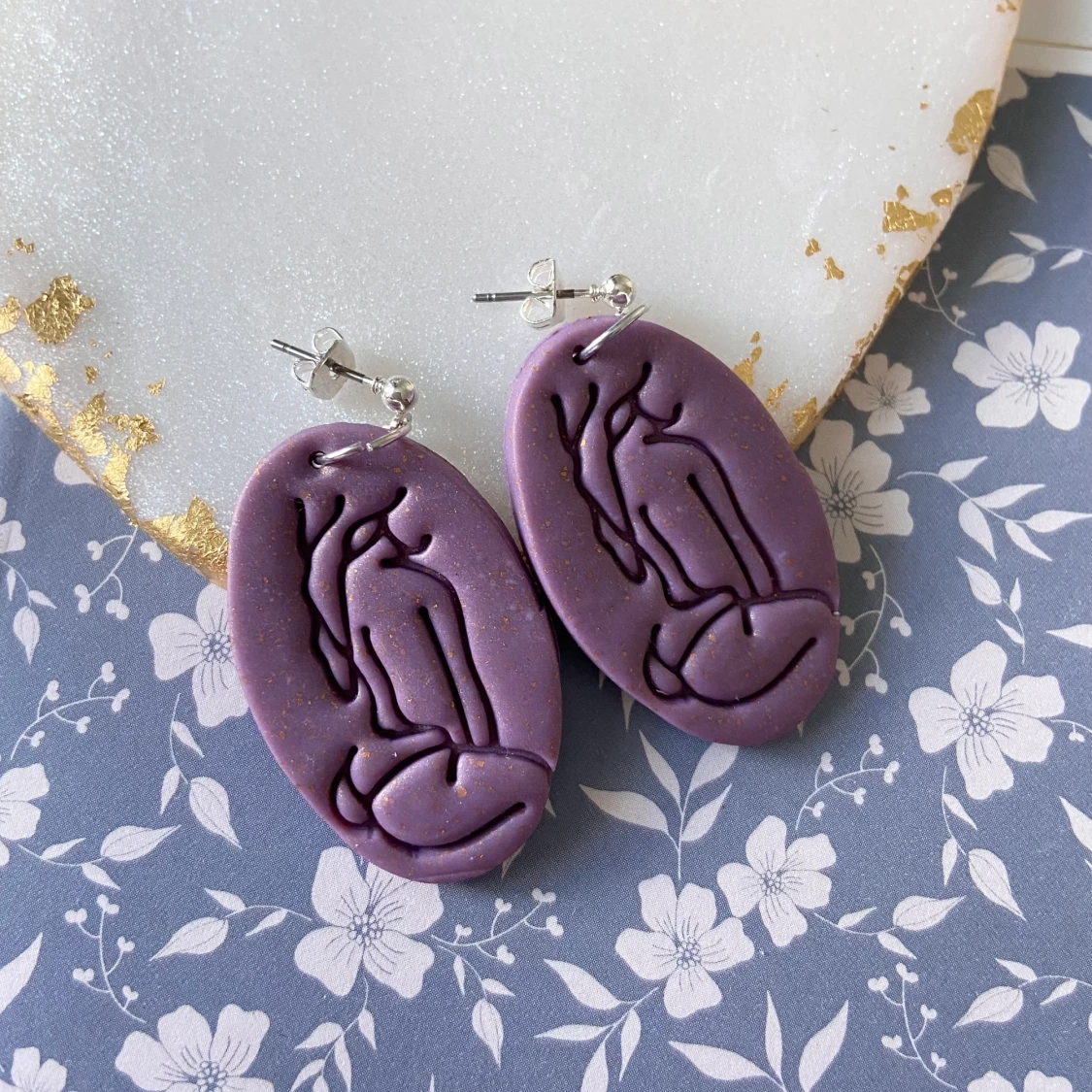 Örhängen av lera  - 91