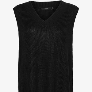 En svart stickad tröja  - Har aldrig använt tröjan 