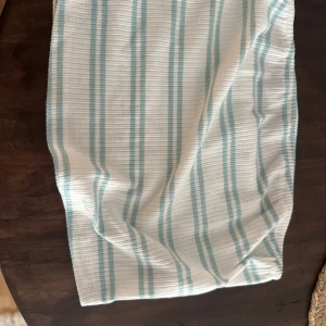 Tub topp - En kort tub topp, aldrig använd då den är lite stor.